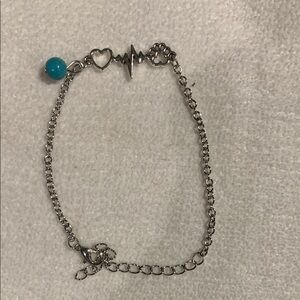 Silver Heartbeat Bracelet with Paw Print and Blue Charm